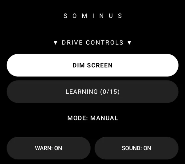 Phone screen showing the Sominus Drive Mode controls: dim screen, learning, manual mode, warning on and sound on.